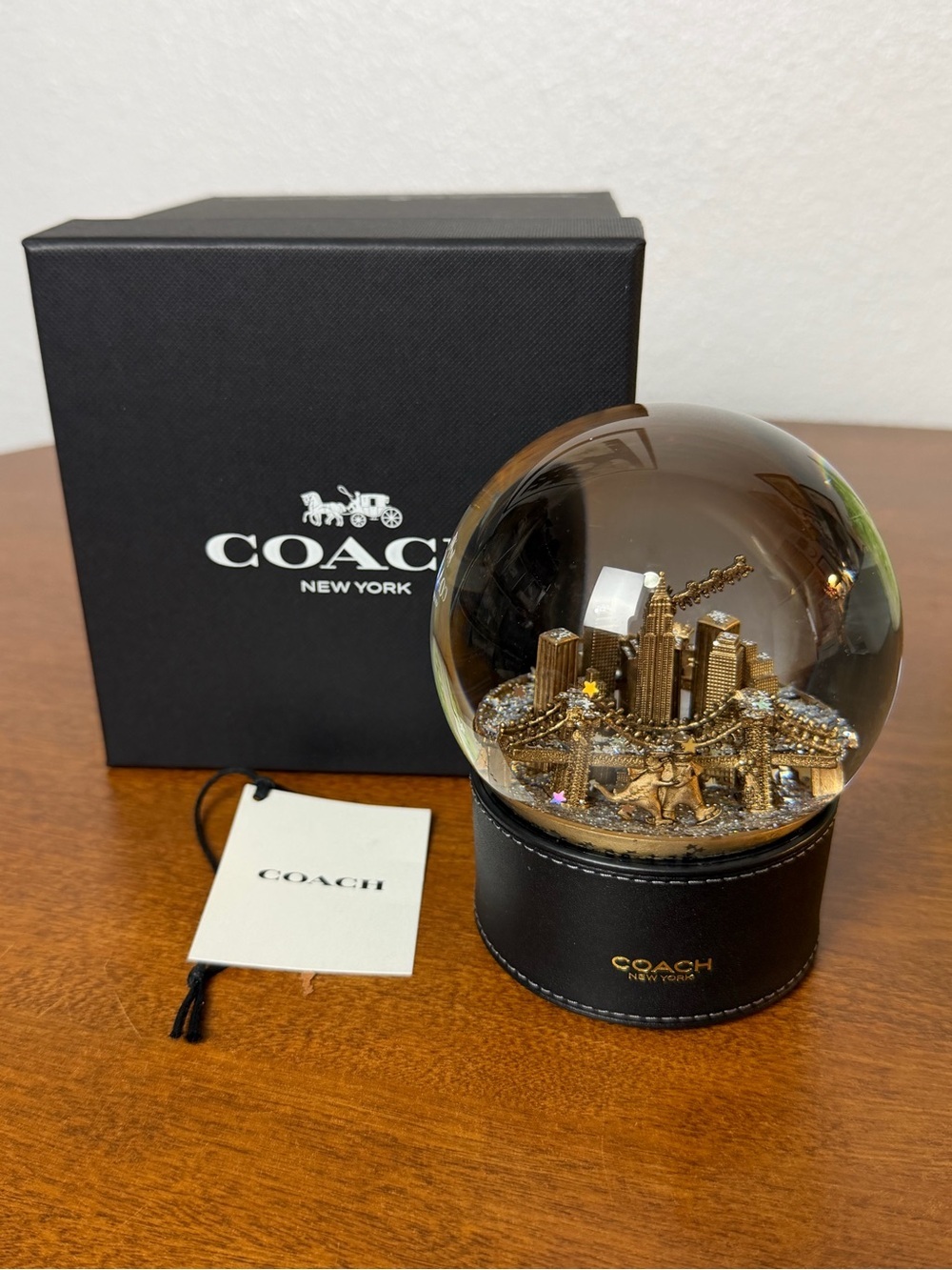 Coach Rexy Gold-tone City Skyline Snow Globe with Black leather Base New